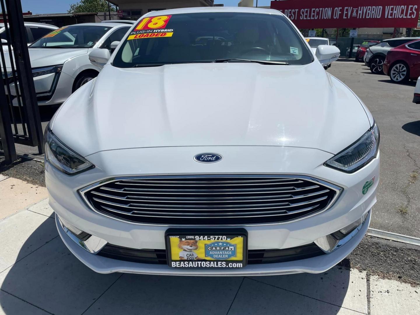 2018 WHITE /BLACK Ford Fusion Energi Titanium (3FA6P0SU6JR) with an 2.0L L4 DOHC 16V HYBRID engine, CVT transmission, located at 744 E Miner Ave, Stockton, CA, 95202, (209) 944-5770, 37.956863, -121.282082 - PLUS TAXES AND FEES - Photo#2